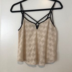 ASTR cream and black top